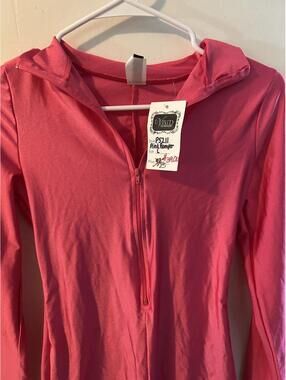 Uptown USA Pink long sleeve zip up romper in size L, NWT